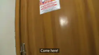 Tattooed Brunette Gives a POV Blowjob in a Restaurant Bathroom