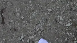 Guy Walks Muddy Outdoors Wearing Dirty Socks