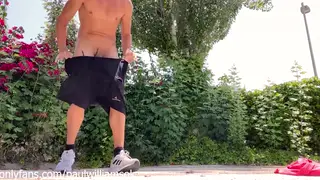Muscular Latino Shows Off His Body Outside a Car
