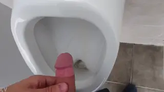 Middle Eastern Teen Pisses at a Public Urinal Outdoors