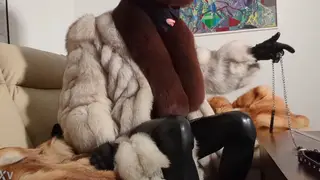 European Fetishist in Fur Coat Endures Leather Spanking