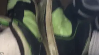 Skater Releases Onto His Worn Sneakers