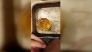 Hairy European Hunk Fills a Jar with His Golden Stream