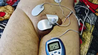 Femdom Teases Bound Sub with Electric Shocks