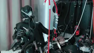 Muscular Sub Endures Latex Bondage and Machine Milking
