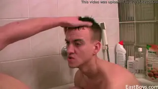 European Twink Gives Blowjob in Bathroom Wearing Uniform