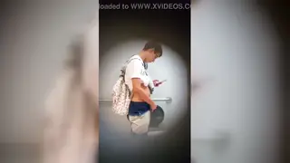 White Guy Pisses Outdoors in Public Bathroom