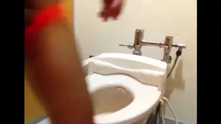 Solo Guy Strokes to a Messy Cumshot in a Public Restroom