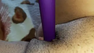 Hairy Lesbian Reaches Shaking Climax with Vibrator