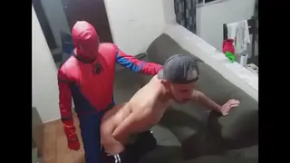 Latino Pair in Halloween Costumes Share a Festive Encounter