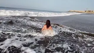 Busty Indian Stepmom Surprises Stepson on Nude Beach