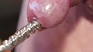 Mature Solo Explores Urethral Sounding in Close-Up POV