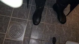 European Hunk Cleans Public Toilet in Rubber Gear