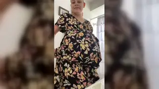 Pregnant MILF Flaunts Curves in Sensual Tease