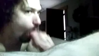 Amateur Gives Quick Blowjob in Dimly Lit Room