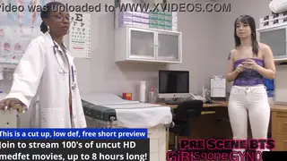 Tattooed Woman in Latex Examines Patient on Hospital Desk