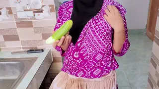 Curvy Indian Wife Stretches Herself with a Large Cucumber