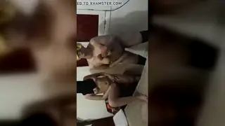 Egyptian Wife Embraces Her Husband in Intimate Moment