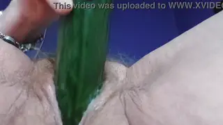 Mature Woman Explores Hairy Intimacy With a Cucumber