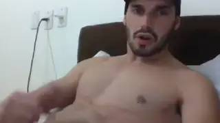 Muscular Latino Daddy Coats Own Face in Webcam Solo