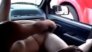 Mature Woman Pleasures Herself with Toys in a Moving Truck