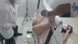 Doctor Examines Bound Latina With Toys in Clinic