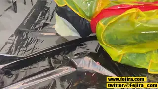 Japanese Lesbians Explore Bondage in Latex Raincoats