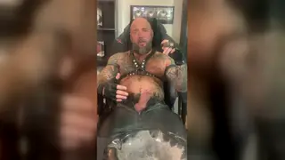 Muscular Bear Dominates Tattooed Sub in Leather